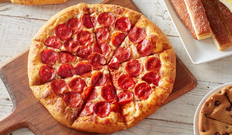 Dairy Farmers Pizza Hut Partner to Give Half Million Pizzas to Graduates