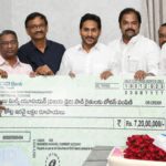 Chief Minister Y.S. Jagan Mohan Reddy handing over the replica of a cheque to the representatives the Kurnool Milk Union at his camp office near Vijayawada on Monday.