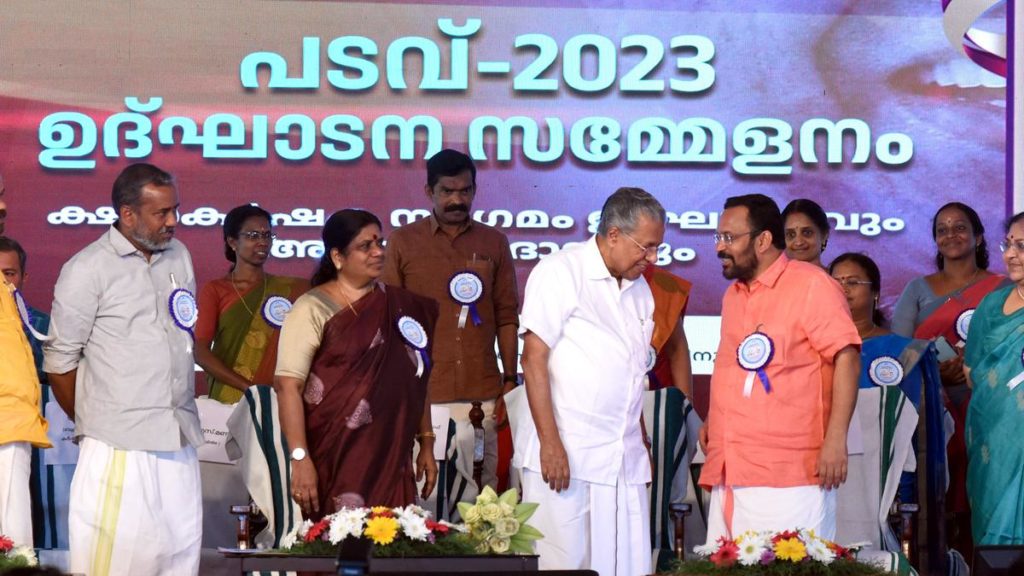 Chief Minister Pinarayi Vijayan interacting with Revenue Minister K. Rajan during the inauguration of Padavu, a meet of dairy farmers, at the College of Veterinary and Animal Sciences, Mannuthy,