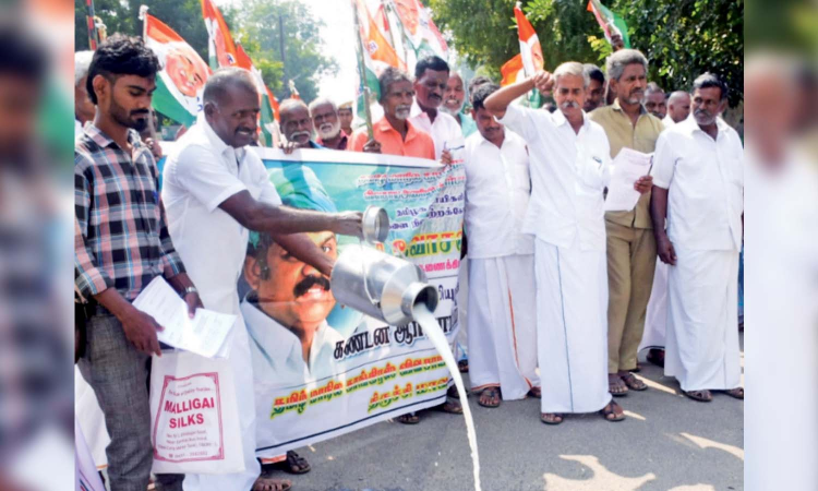 Tiruchy farmers demand GO withdrawal, spill milk in protest