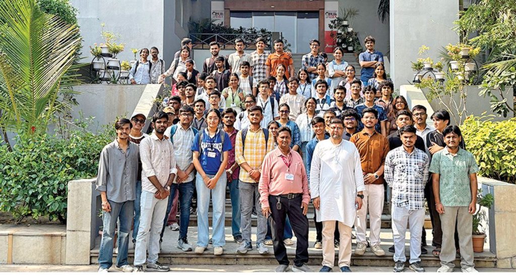 Engineering students examine advanced dairy automation